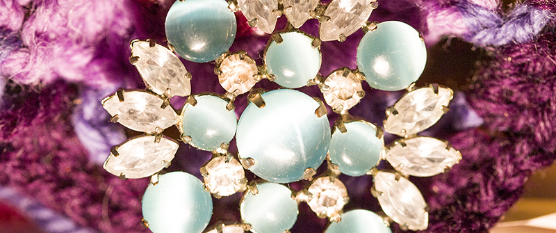 a sparkling aqua and diamante brooch